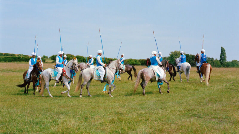Riders from Gujjar Club in Manchester at a neza bazi event in Dewsbury, photo for Hyphen by Megan Eagles