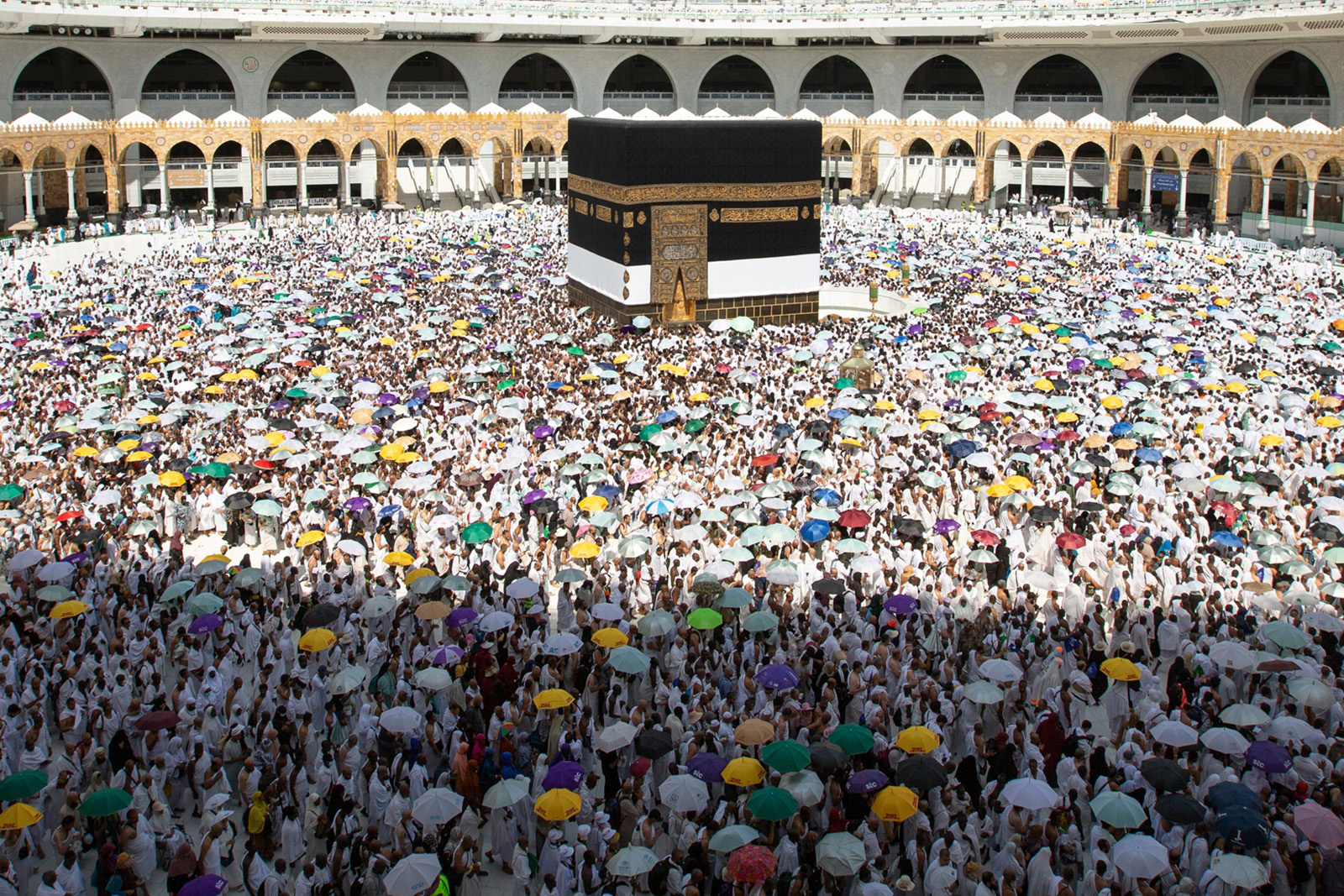 Muslim pilgrims gather around the Kaaba, Islam's holiest shrine, at the Grand Mosque in the holy city of Mecca early on June 28, 2023, as they perform the farewell circumambulation or "tawaf", circling seven times around the large black cube, which is the focal point on the final day of the hajj. (Photo by Abdel Ghani BASHIR / AFP) (Photo by ABDEL GHANI BASHIR/AFP via Getty Images)