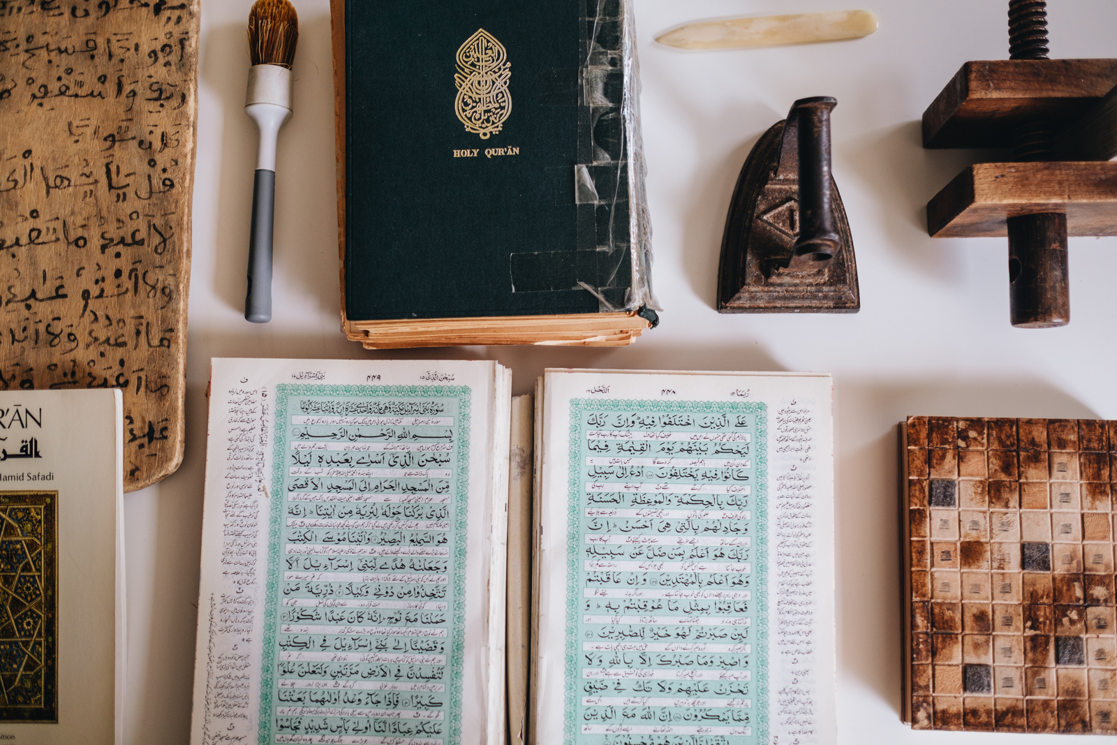 Book binder and Qur'an repair expert Ziyaad Lorgat photographed in Leicester for Hyphen by Hassan Raja.