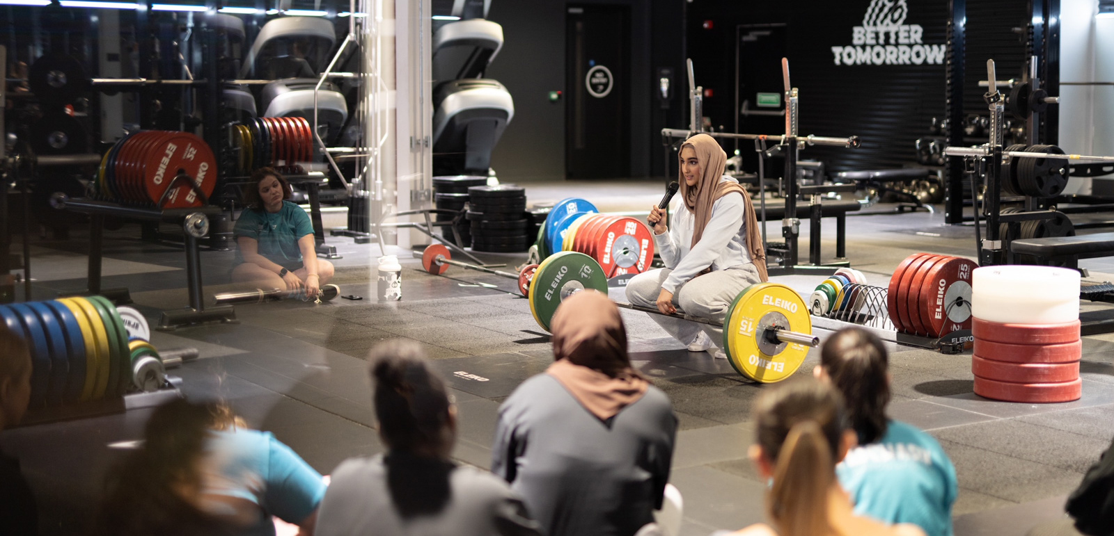 Gymshark model Umaymah Makda prepares to lift weights. Photograph courtesy of Umaymah Makda