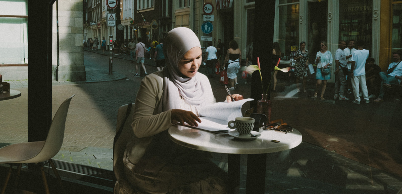 From a cafe in downtown Amsterdam, lawyer Elsa van de Loo sits discusses the implications of the new layer added to the Netherlands' headscarf ban for Dutch Muslims. 