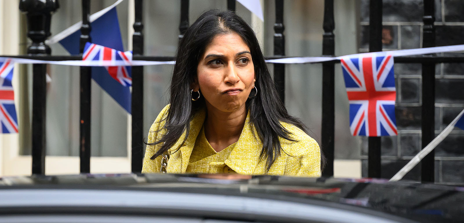 LONDON, ENGLAND - MAY 09: Home Secretary Suella Braverman departs from number 10, following the weekly Cabinet meeting at Downing Street on May 09, 2023 in London, England. The Conservative Party lost over 1000 seats in the local council elections that took place last week. (Photo by Leon Neal/Getty Images)