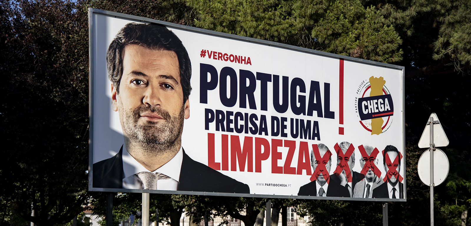 A billboard of the populist far right party Chega with a photo of the President Andre Ventura and the slogan 'Shame, Portugal needs some cleanness' is pictured in Santarem, Portugal on July 7, 2023. (Photo by Emmanuele Contini/NurPhoto via Getty Images)