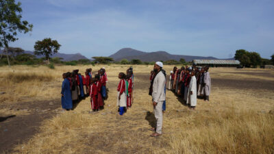 Hassan Noor Sayid (aka Aar Maanta) with children from Wamy School and Orphanage Home in Isiolo, Kenya, photographed by Mohamed Mohamud for his Somali Sideways project