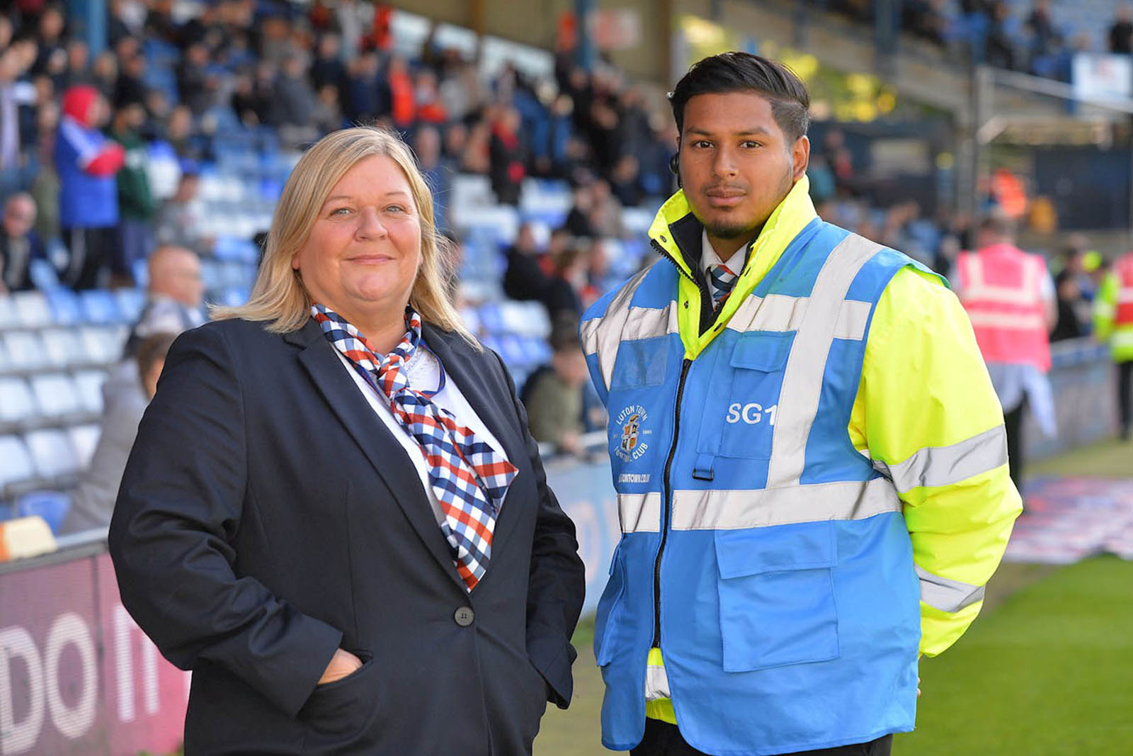 Match day steward Kibriya Rahim (right). Photo by Gareth Owen, courtesy of Luton Town Football Club