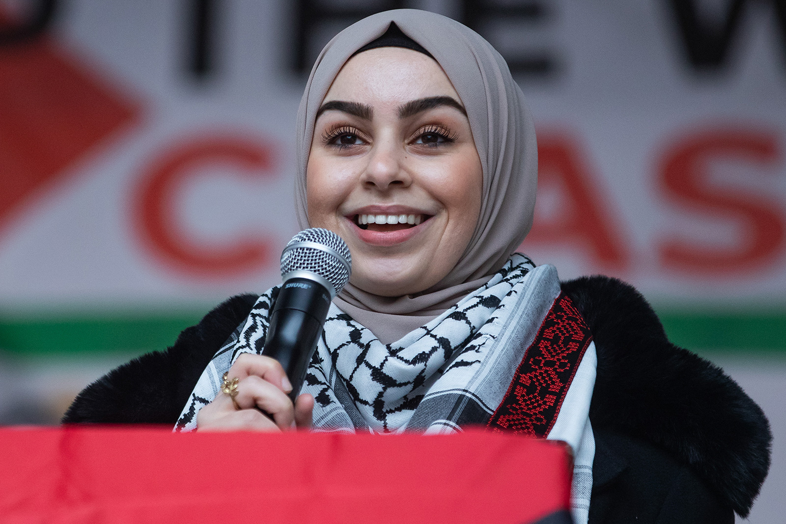 British-Palestinian Leanne Mohamad giving a speech