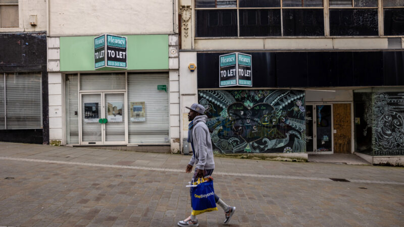 A shopper walks through an empty Bradford high street