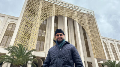 The Young Imam, Sabah Ahmedi standing outside a mosque