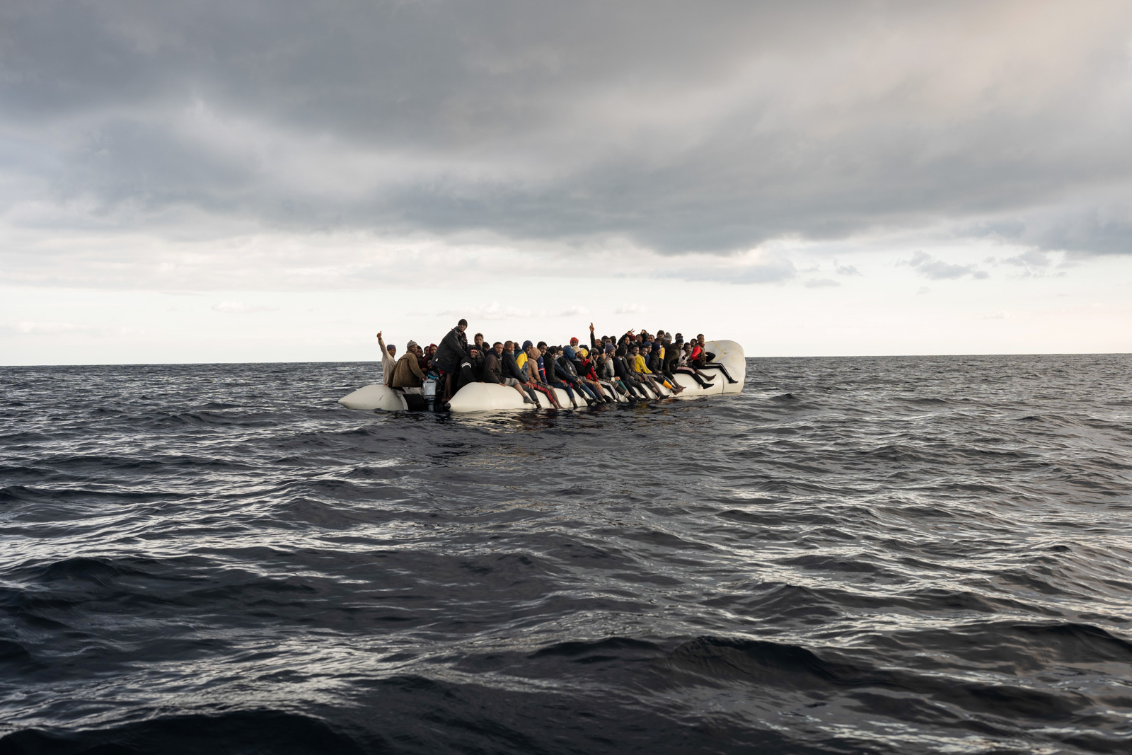 Some of the 156 people rescued from two boats in distress by NGO Emergency during an operation in February 2023. Photo by Giulio Piscitelli