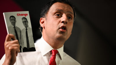 Leader of the Scottish Labour party Anas Sarwar delivers a speech on stage.