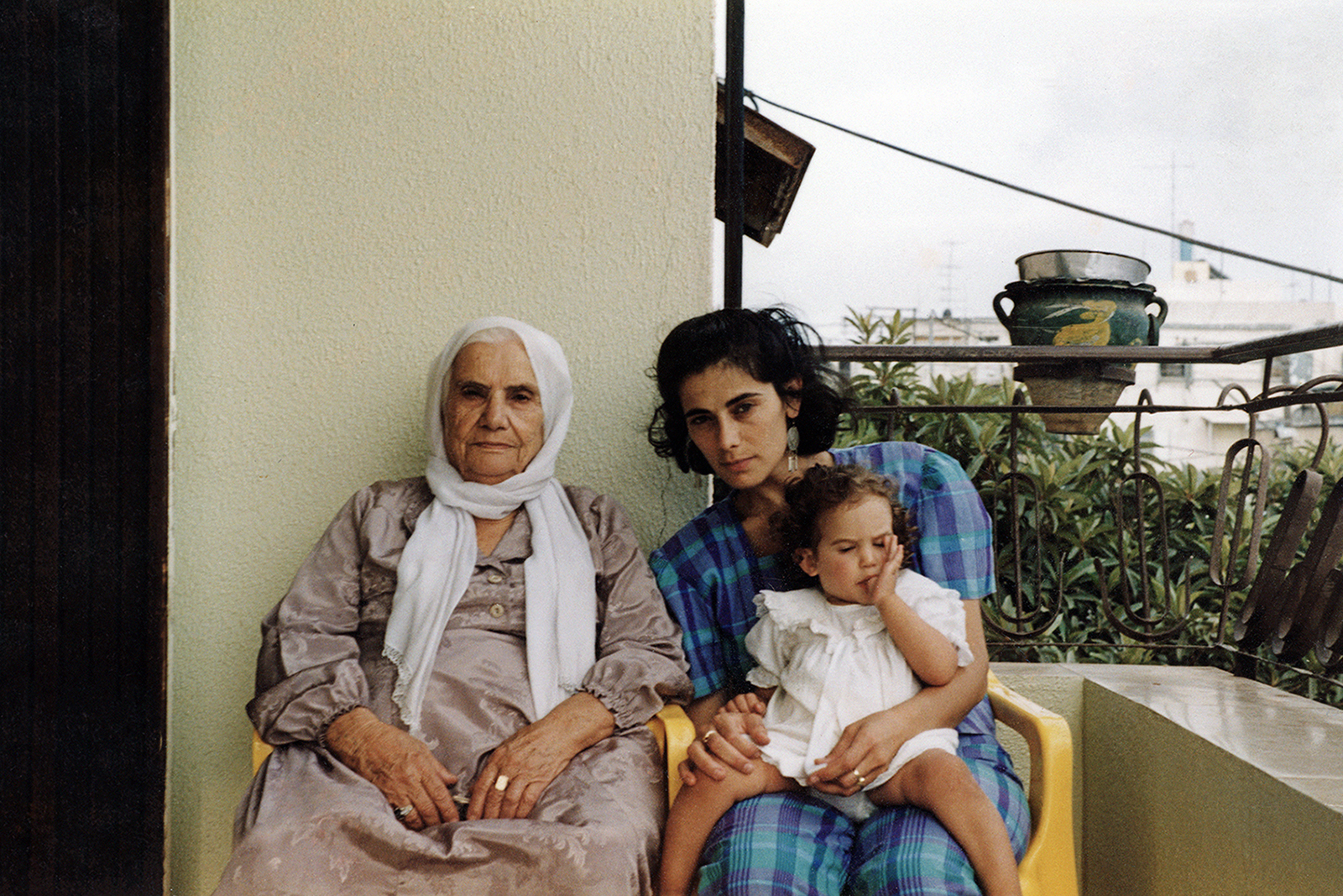 Lina Soualem as a baby with her grandmother and mother Hiam Abbass on a balcony in the 1990s. Photo courtesy of Lina Soualem.
