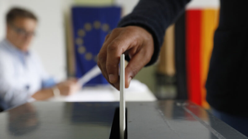 A voter casts their ballot in the European parliamentary elections.