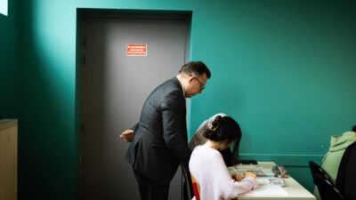 School leader Eric Dufour monitors students during a history class at the Lycèe Averroës, a private Muslim school in Lille, France. Photo by Ed Alcock/MYOP