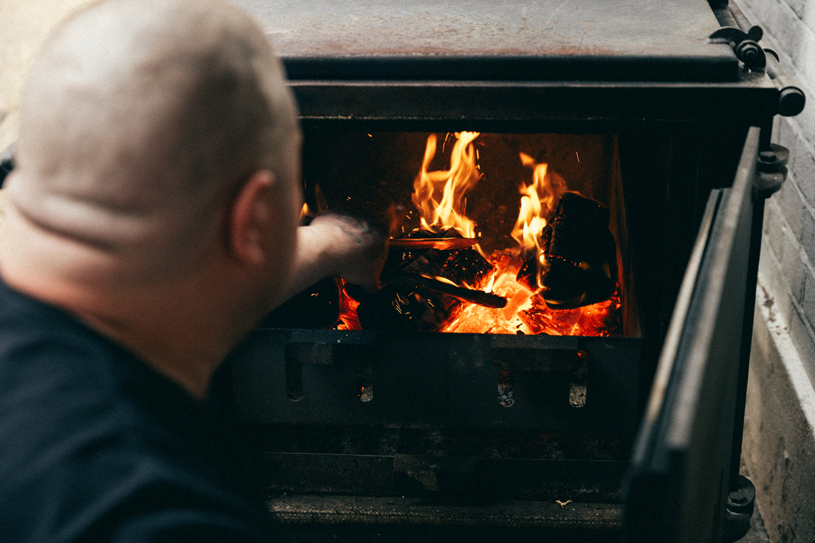 Burnt Smokehouse, Leyton
Owner and chef Tiberius Tudor working on the fire. Photo by Jack Spicer Adams, courtesy of Burnt Smokehouse