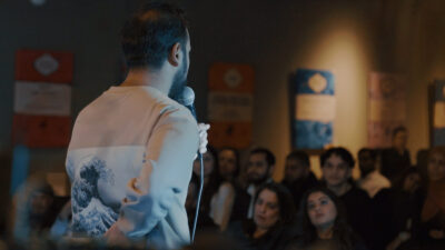 Safwaan Rahman, founder of Halal Fried Comics night, performing at one of their nights. Photo courtesy of Halal Fried Comics
