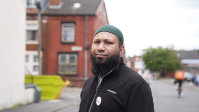 Councillor Mothin Ali from the Green Party Gipton and Harehills ward, photographed in the Leeds suburb of Harehills. Picture date: Sunday July 21, 2024. Green party councillor Mothin Ali says he won't stop speaking out, despite a shaky start to life in public office. "I'm just too stubborn for that." Photo by Danny Lawson/PA Images/Alamy Stock Photo