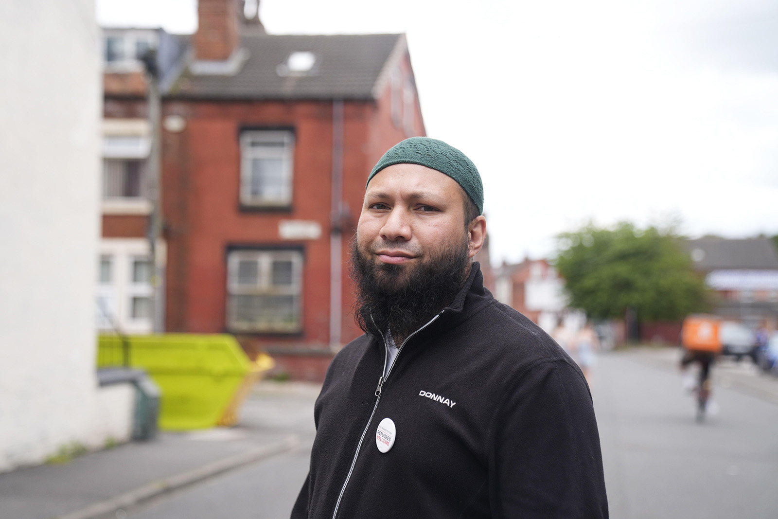 Councillor Mothin Ali from the Green Party Gipton and Harehills ward, photographed in the Leeds suburb of Harehills. Picture date: Sunday July 21, 2024. Green party councillor Mothin Ali says he won't stop speaking out, despite a shaky start to life in public office. "I'm just too stubborn for that." Photo by Danny Lawson/PA Images/Alamy Stock Photo