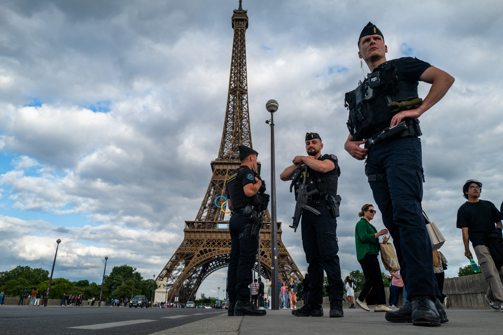 French gendarmes patrol near the Eiffel Tower ahead of the Paris 2024 Olympic Games. Photo by Jewel Samad/AFP/Getty Images