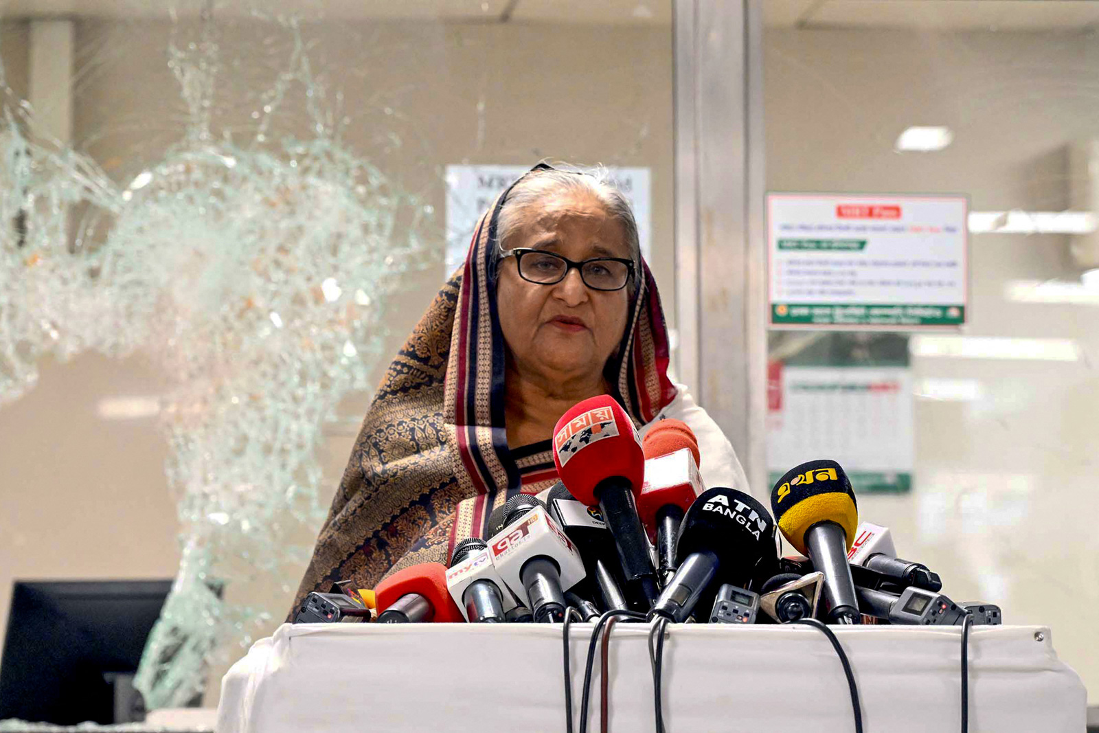 In this handout photograph taken and released on July 25, 2024 by Bangladesh Prime Minister's Office, Prime Minister Sheikh Hasina addresses the media at a vandalized metro station in Mirpur, after the anti-quota protests. The unrest began last week when the youth wing of Hasina's ruling Awami League and police officers attempted to suppress running student demonstrations against job quotas for civil servant hires. The scheme was introduced by Hasina's father in 1972 and until Sunday reserved nearly a third of all government jobs for the families of veterans from the independence war with Pakistan. Photo by Bangladesh Prime Minister's Office/AFP via Getty Images