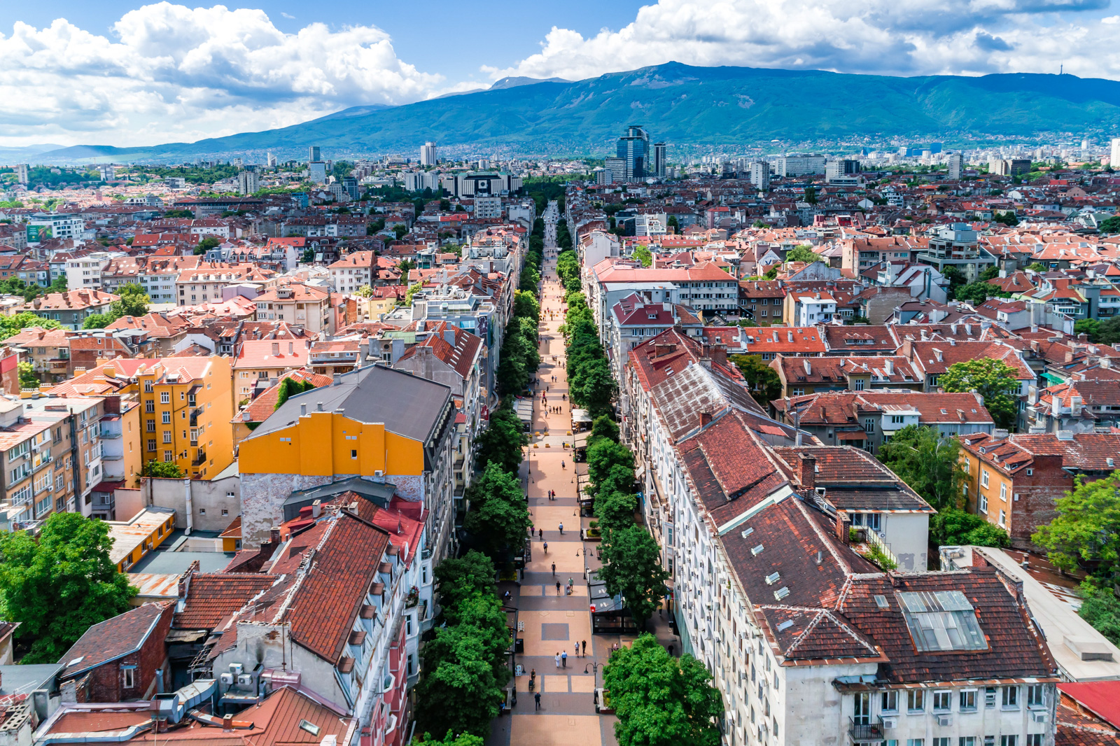 Wide aerial drone shot of  Sofia, Bulgaria, Vitosha street 