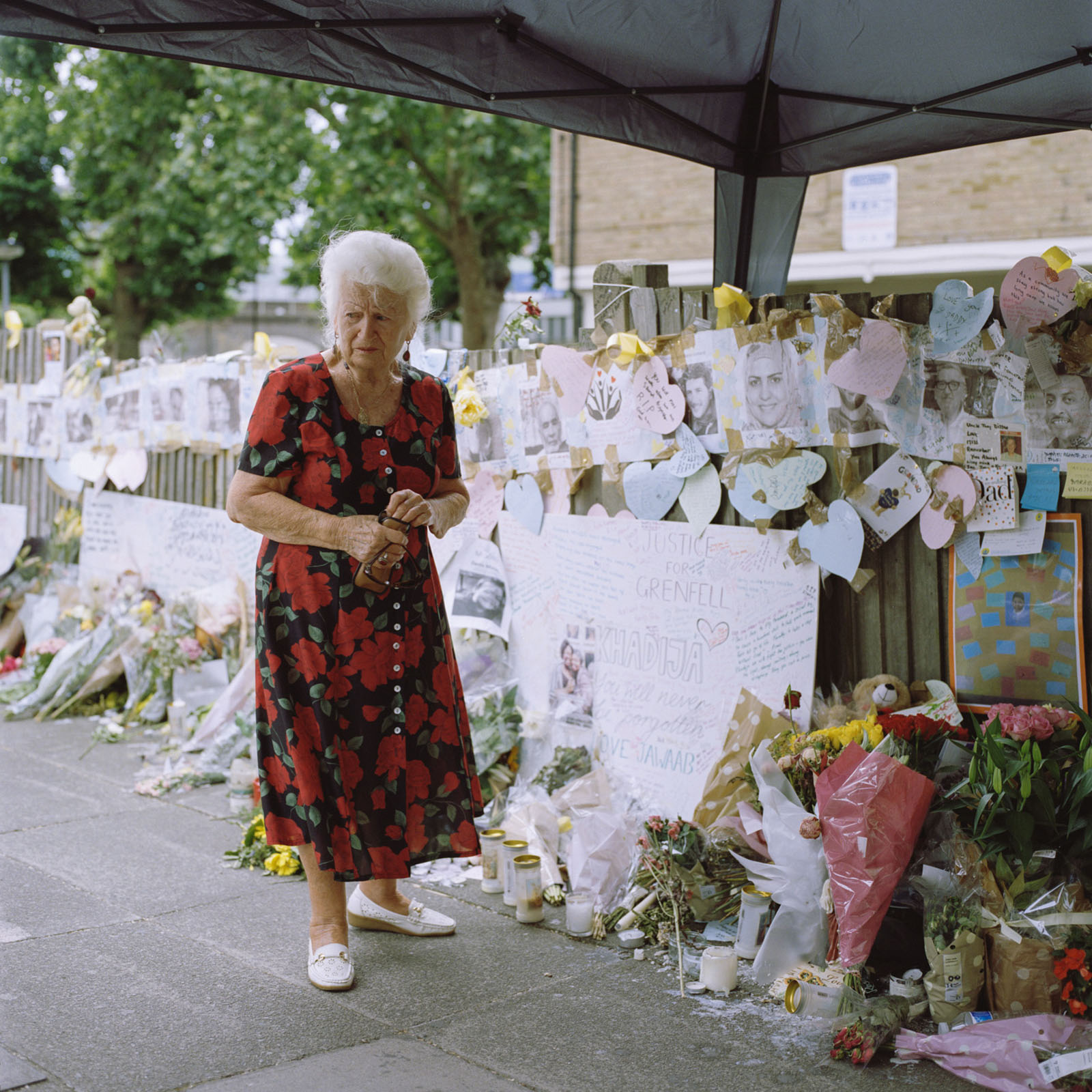 At the local bus stop on Latimer Road, students looked at flyers of missing Grenfell Tower residents, many of whom would later be pronounced dead. Photography by Nicola Muirhead