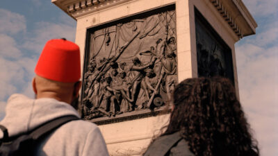 Learning about Black Muslim history with tour guide Abdulmaalik Tailor in London. At the base of Nelson's Column, on the left hand side you can see a depiction of George Ryan, a black sailor who fought alongside the British at the Battle of Trafalgar.