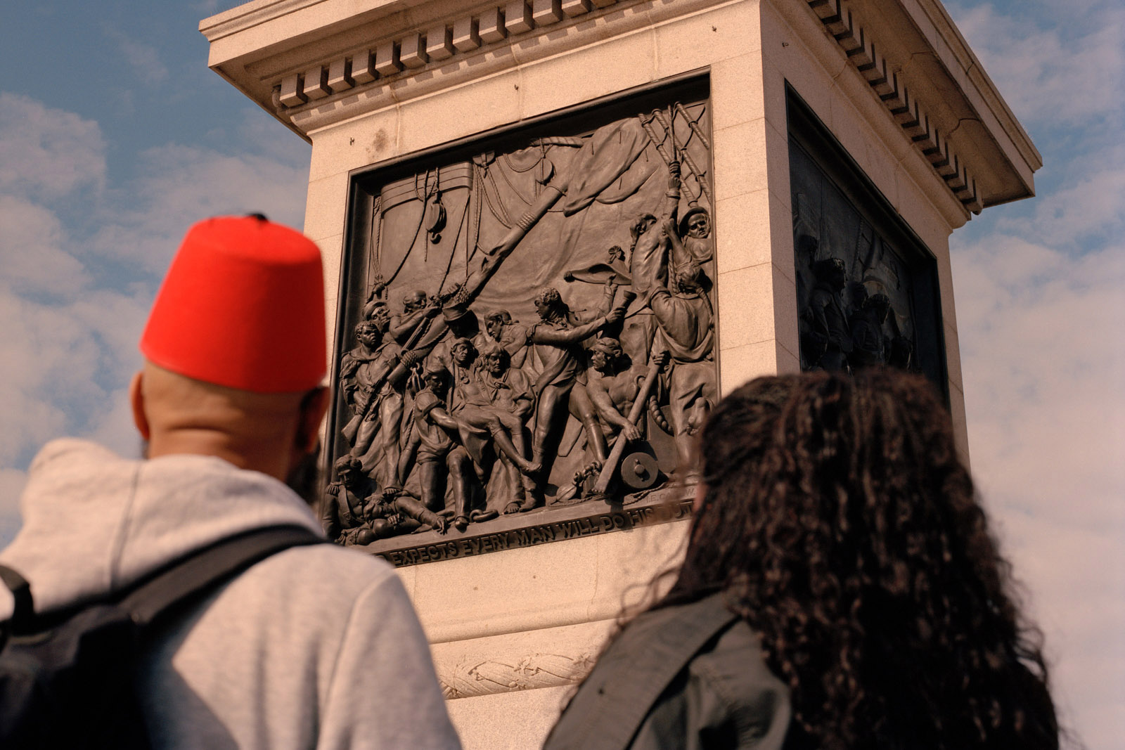 Learning about Black Muslim history with tour guide Abdulmaalik Tailor in London. The base of Nelsons Column, on the left hand side you can see a depiction of George Ryan, a black sailor who fought alongside the British at the Battle of Trafalgar. 