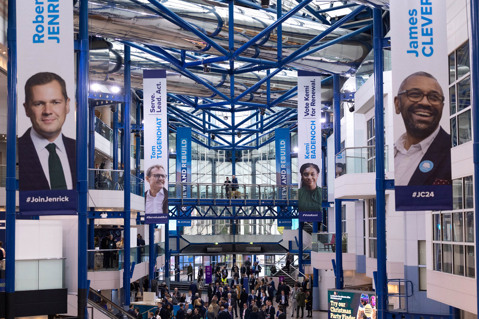 Aerial view of the crowd and banners for Robert Jenrick, Tom Tugendhat, Kemi Badenoch and James Cleverly at the Conservative Party Conference at the International Conference Centre in Birmingham, England, on September 29, 2024. 