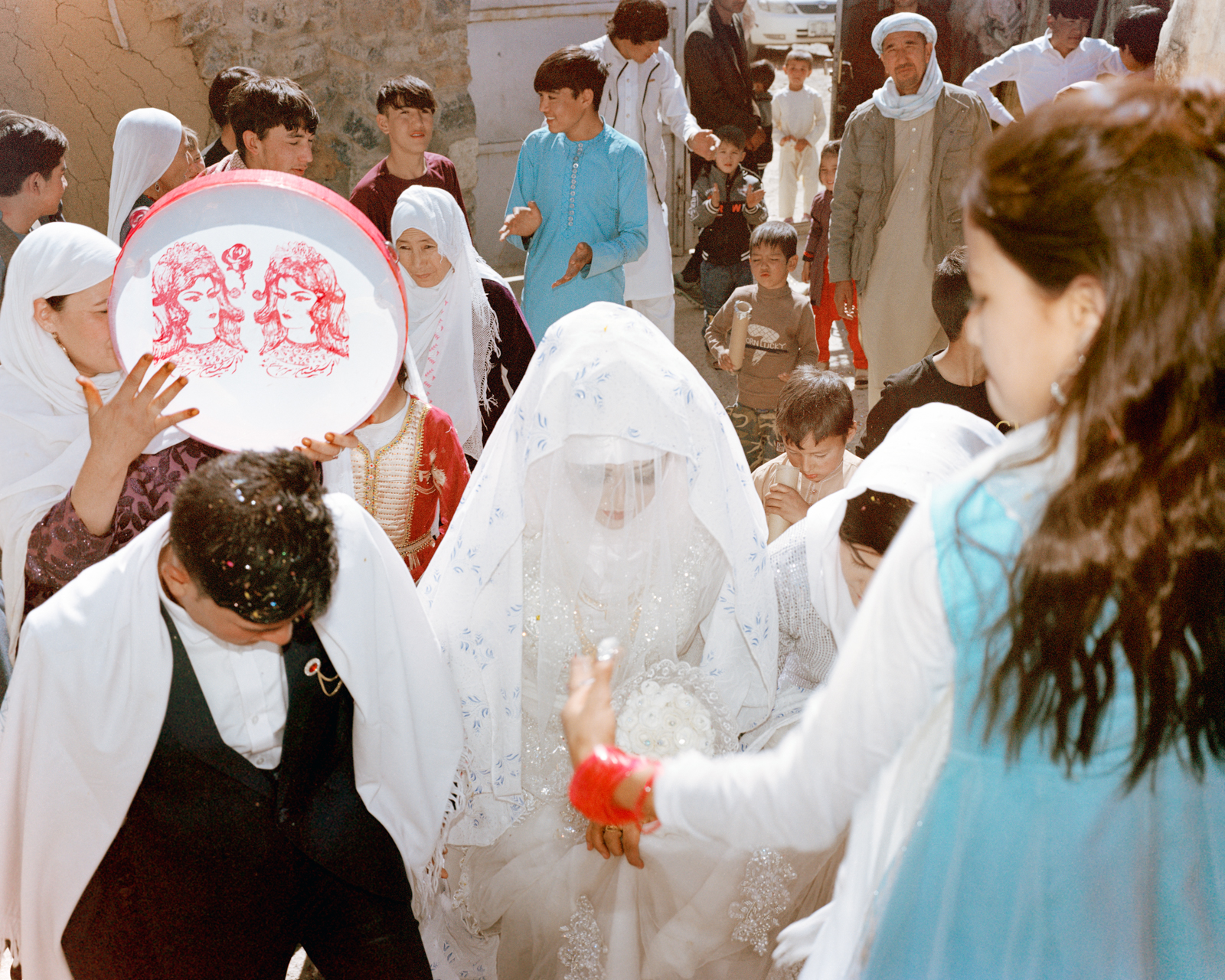 The wedding ceremony of Amir Jan, 20, and Asifa, 18, is held in a house in a village in Bamiyan province in central Afghanistan. Many weddings have been suspended or are held in secret since the Taliban regained control of the country. 