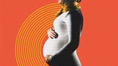 Profile of a pregnant woman wearing a headscarf