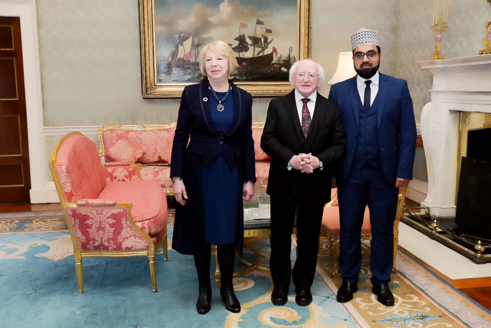 President Michael D Higgins and his wife Sabina Higgins, with Dr. Umar Al-Qadri.