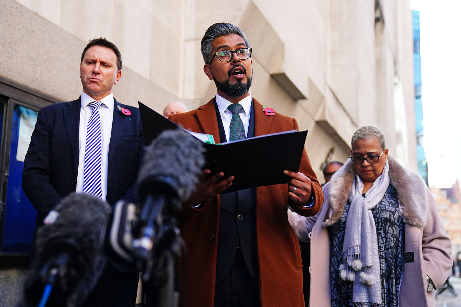 Sal Naseem, Regional Director for London at the Independent Office for Police Conduct (IOPC), reads a statement outside the Old Bailey in London, after two Metropolitan Police officers pleaded guilty to sharing photos of the bodies of two murdered sisters on WhatsApp. Picture date: Tuesday November 2, 2021.