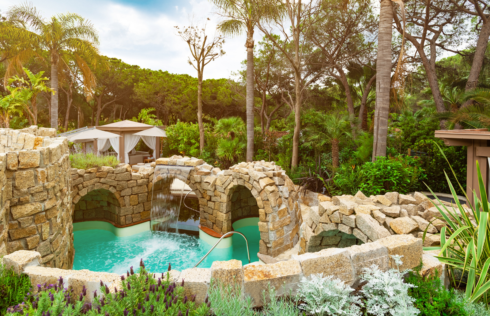 The stone grotto and pool area at Forte Village resort in Sardinia, Italy