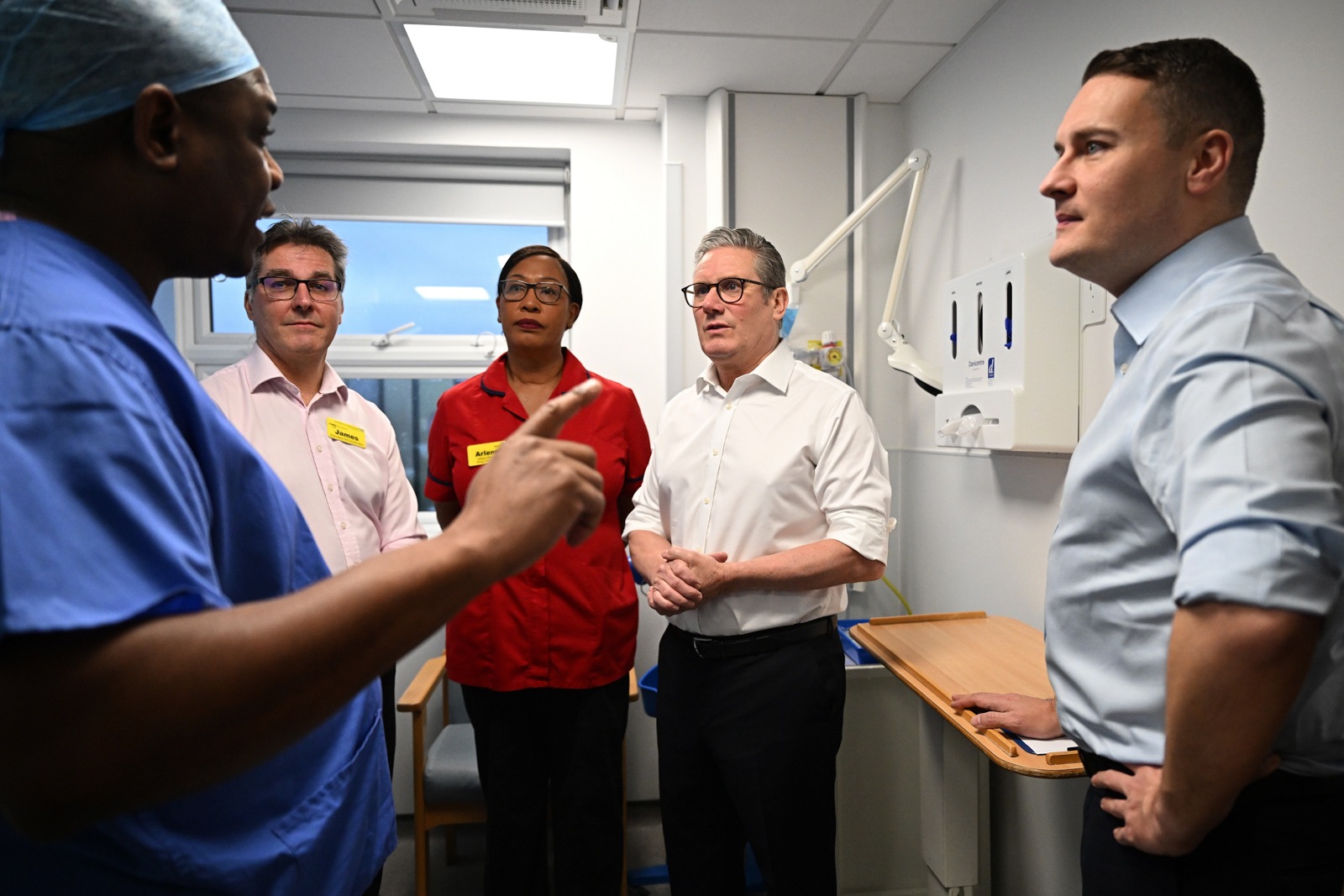 Prime Minister Keir Starmer accompanied by Wes Streeting, Secretary of State for Health and Social Care visits a healthcare provider in Surrey to deliver remarks on reducing NHS wait times.