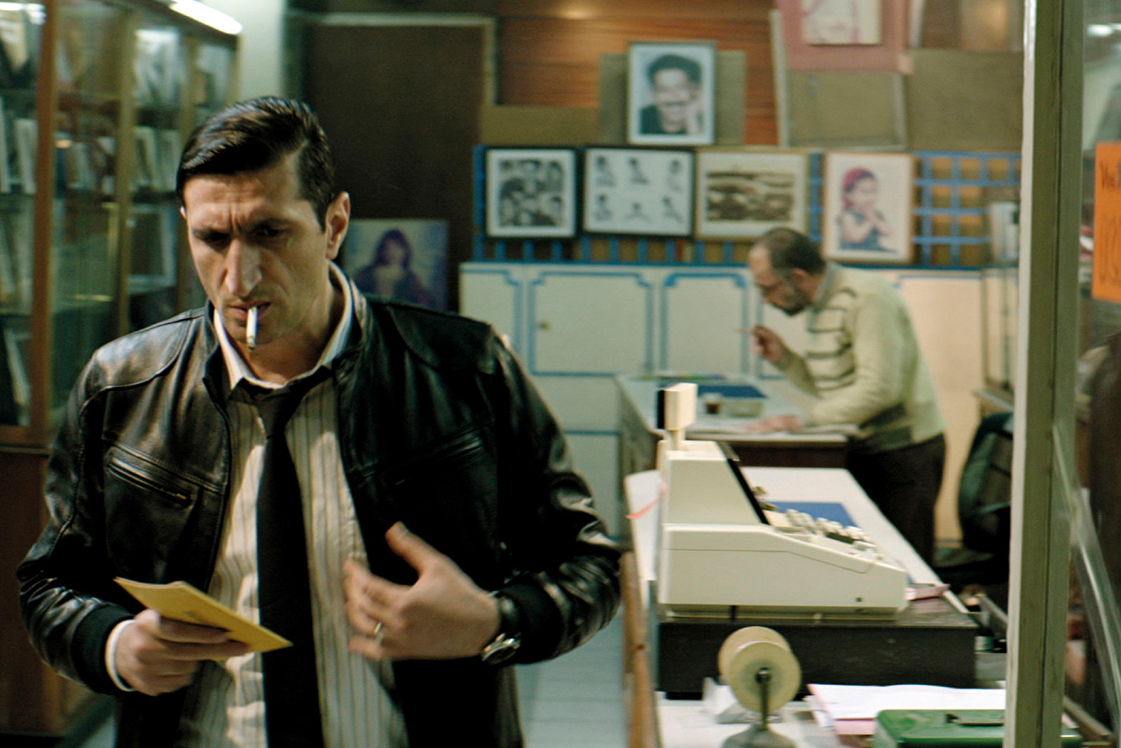 Film still from the THE NILE HILTON INCIDENT (2017) by Tarik Saleh, (left) actor Fares Fares.