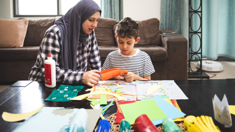 Mother and child doing creative activities together