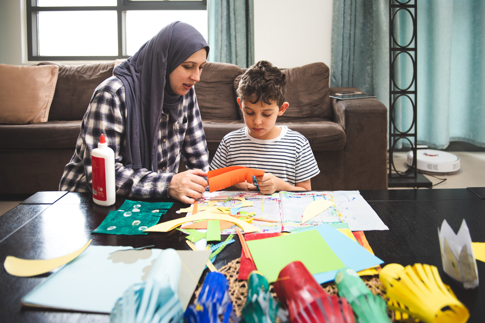 Mother and child doing creative activities together