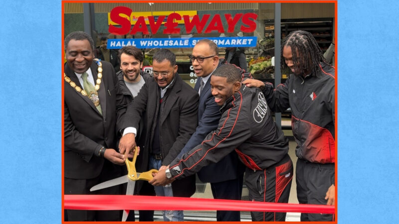 Saveways co-founders Kaysor Ali (3rd from left), Karl Wilson (2nd from right) and Casyo Johnson (right) open the supermarket on 1 February 2025.