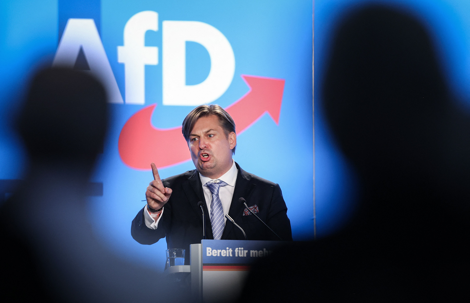 Maximilian Krah, Member of the European Parliament of Germany's far-right Alternative for Germany (AfD) party, gestures as he speaks during the European Election Assembly of German far-right party Alternative for Germany (AfD - Alternative fuer Deutschland) at the fair grounds in Magdeburg, eastern Germany on July 29, 2023. Coming after recent local poll wins, the party is laying the ground for what it hopes will be further victories at European and state elections in 2024, as well as a national vote in 2025. 