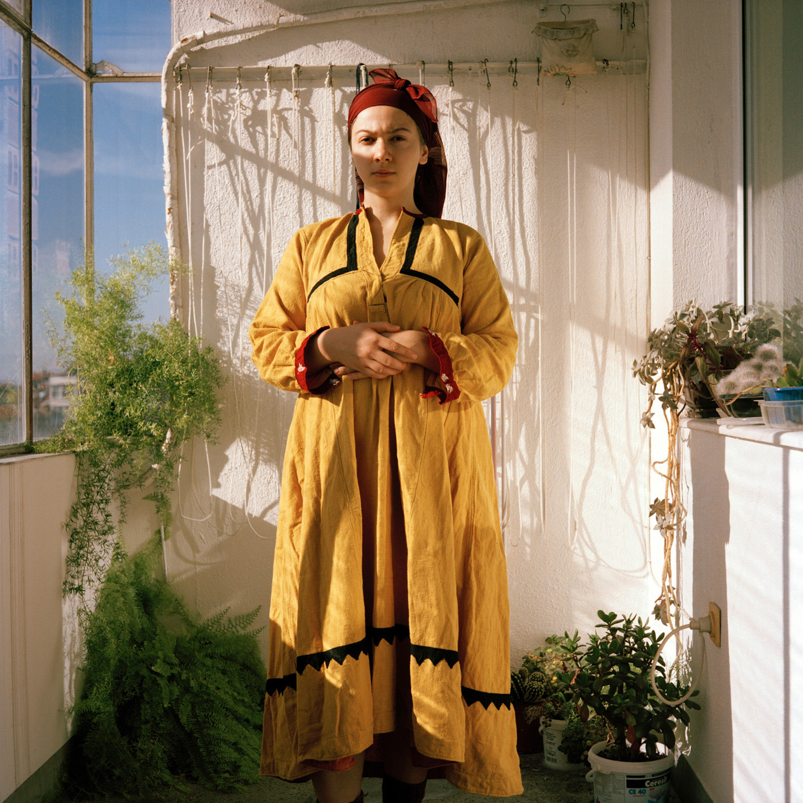 Vera Hadzhiyska self portrait, wearing her grandmother's dress. 