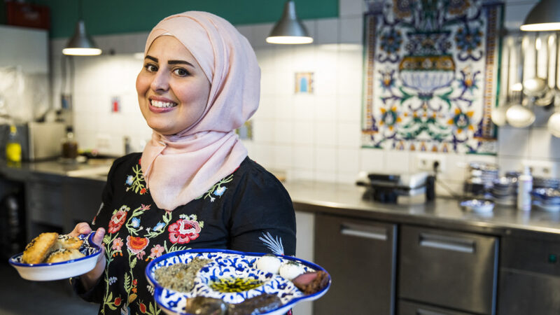 Malakeh Jazmati poses for a picture in her kitchen in Berlin on August 28, 2017. Jazmati who came from Syria to Germany as a refugee 2-years-ago has set up her own catering business tempting event holders in the German capital with middle eastern food.