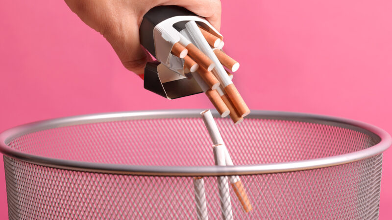 cigarettes being tipped into a bin