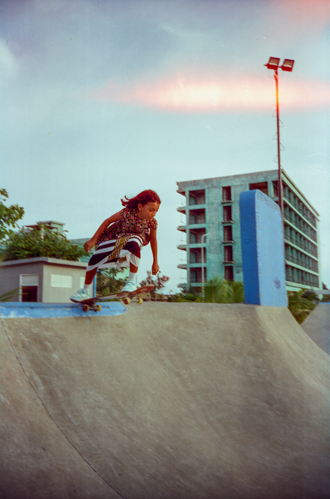 Photographs of women and girls skateboarding, taken in the Maldives over six weeks of summer 2024 by Sophia Nasif.