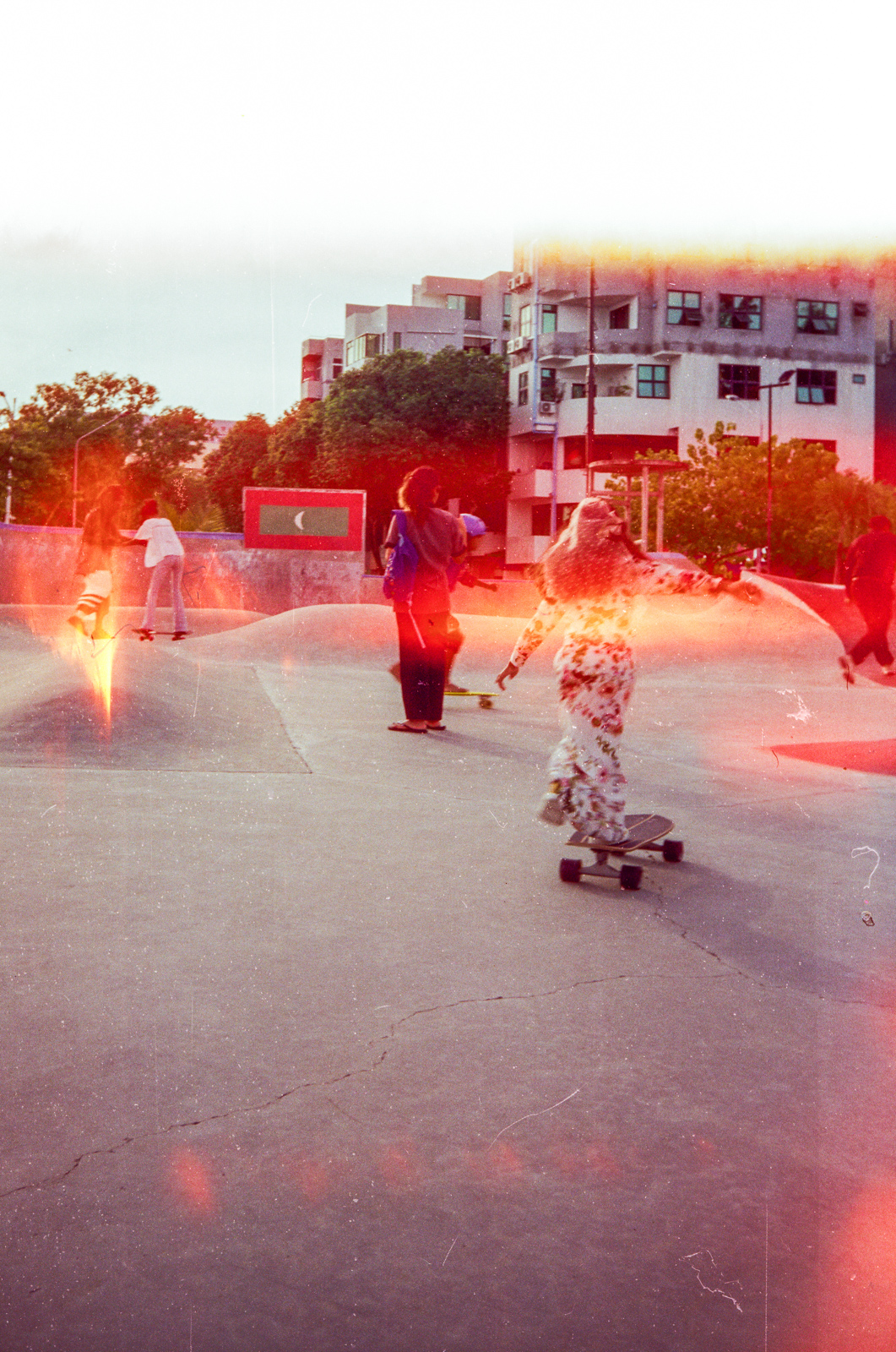 Photographs of women and girls skateboarding, taken in the Maldives over six weeks of summer 2024 by Sophia Nasif.