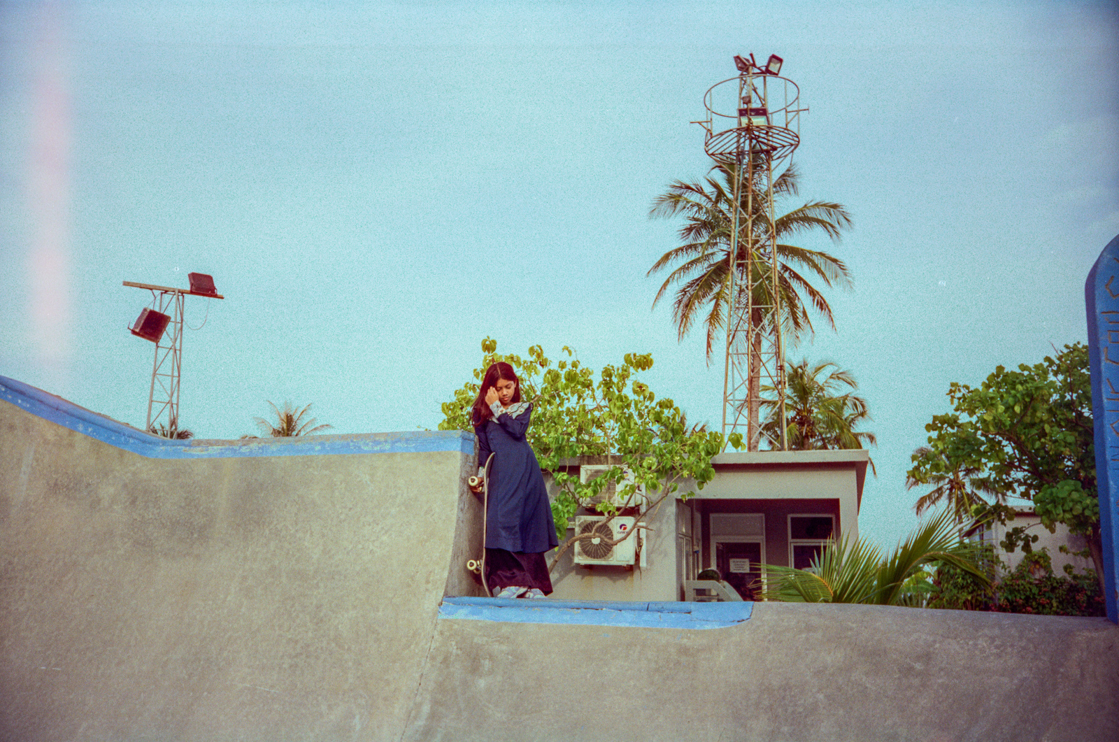 Photographs of women and girls skateboarding, taken in the Maldives over six weeks of summer 2024 by Sophia Nasif.