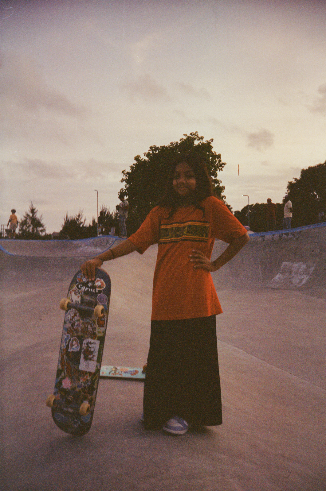 Photographs of women and girls skateboarding, taken in the Maldives over six weeks of summer 2024 by Sophia Nasif.