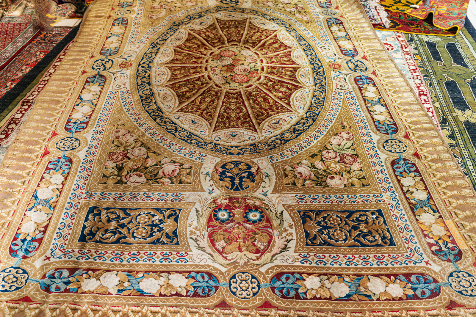 An antique English rug at Thames Carpets