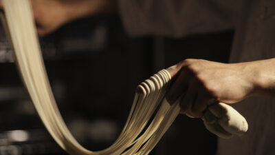 A chef making hand-pulled Lanzhou noodles