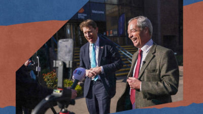 Reform UK leader Nigel Farage (R), Richard Tice MP (L), Deputy Leader of Reform UK and Member of Parliament for Boston and Skegness react as they speak to the media at British Steel Scunthorpe on 8 April, 2025.