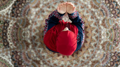 Muslim woman praying.